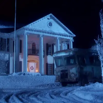 Snowy house in the dark