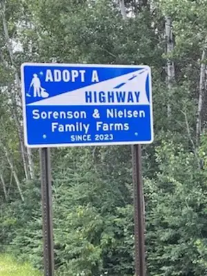 Adopt a highway road sign