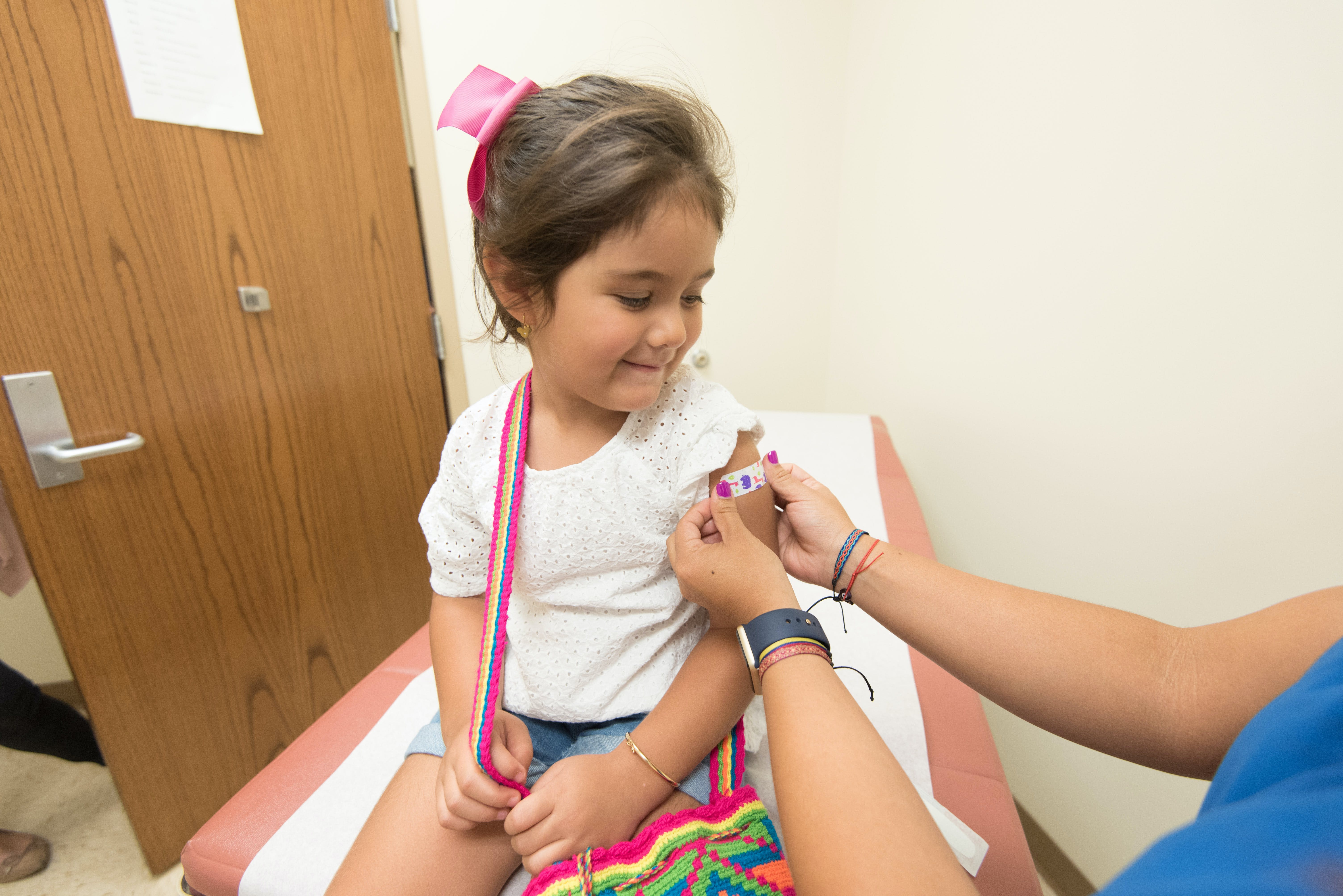 Child receives a vaccination 